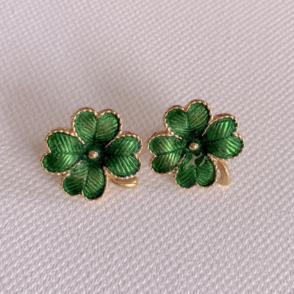 Vintage Avon four leaf clover shamrock post earrings with a green enamel finish